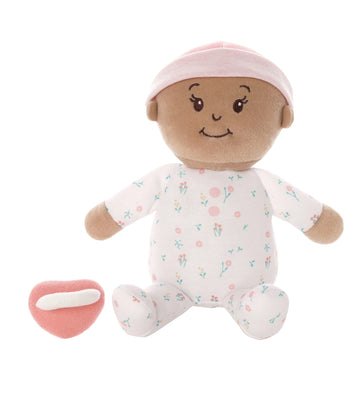 Beige organic cotton baby doll with magnetic pacifier and weighted base for sitting. Hypoallergenic, machine-washable, EN71 certified for newborns 0+ months.